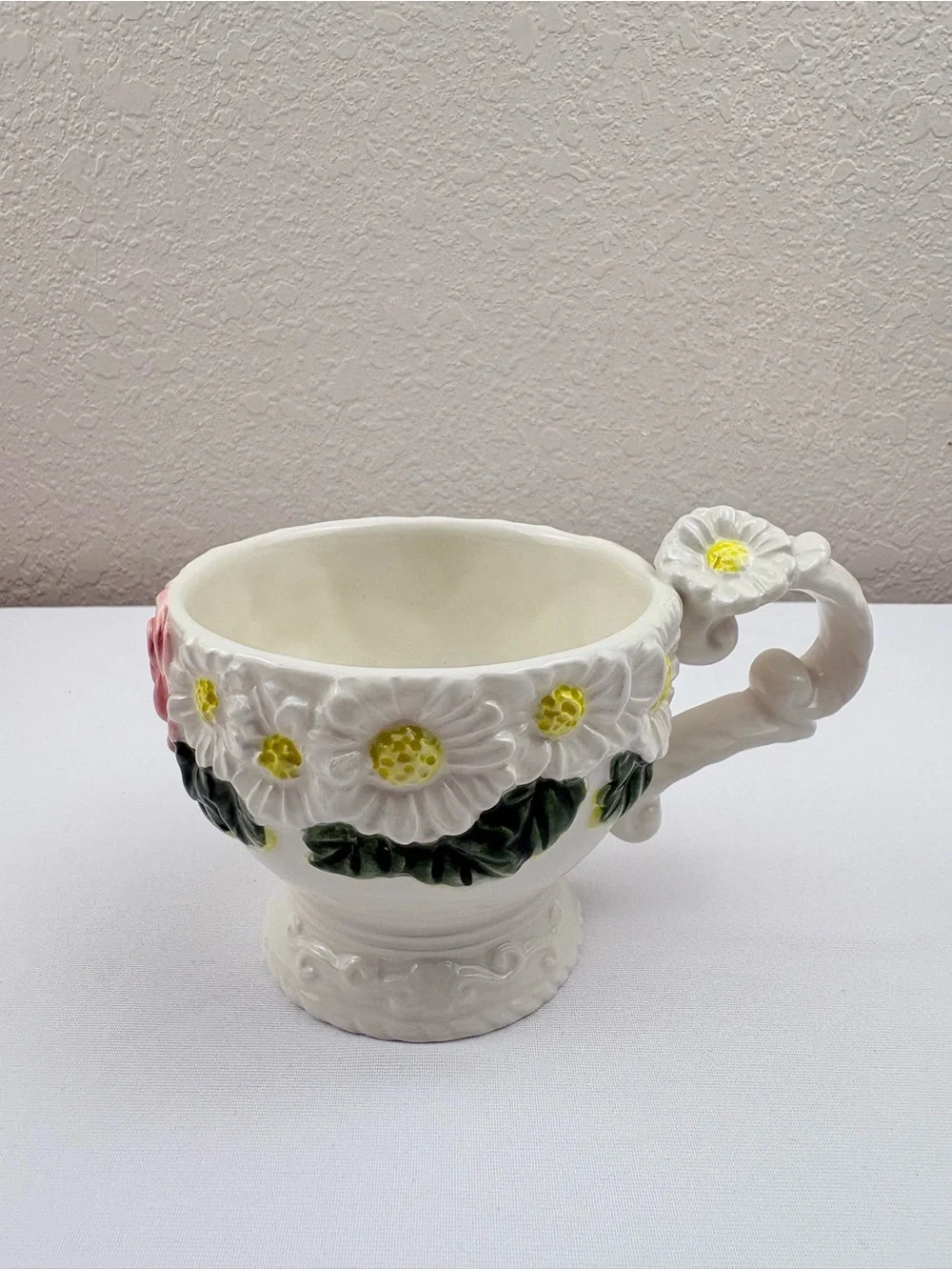 White Teacup & Saucer Featuring Ceramic Base, Raised White Daisies & Pink Roses